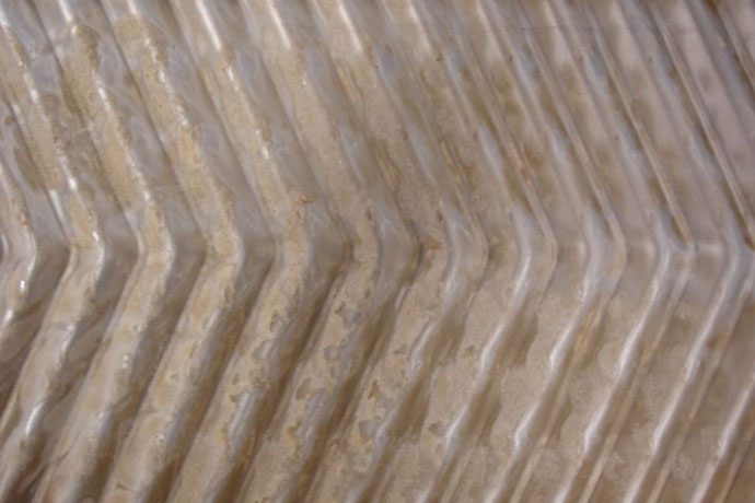 UHT殺菌機内部の加熱プレート(乳化剤なし) UHT殺菌機内部の加熱プレート(乳化剤なし)